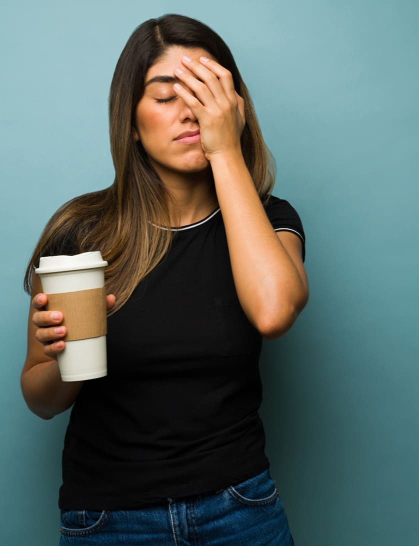 tired woman with coffee