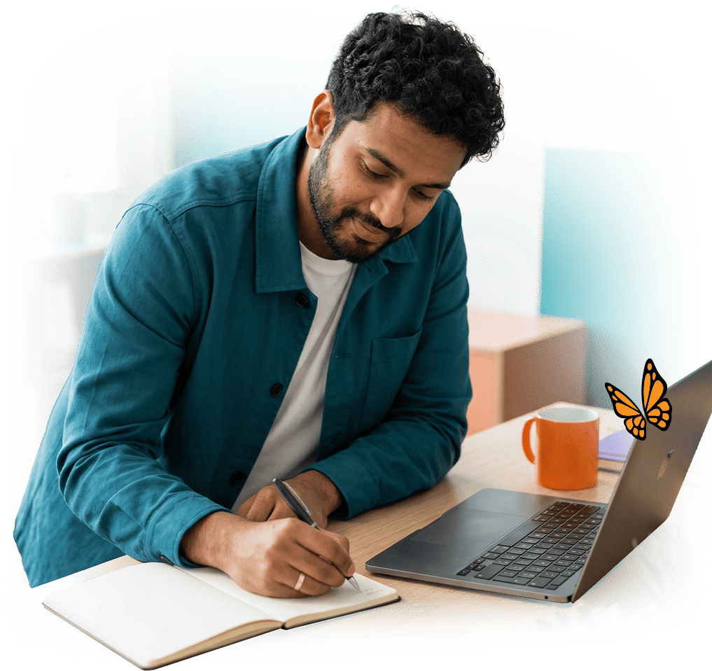 man is writing notes